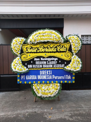 Papan Bunga Duka di Lantan