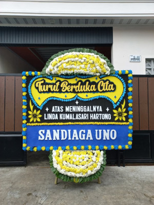 Papan Bunga Duka di Lantan